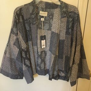 Patterned cropped never worn overlay.